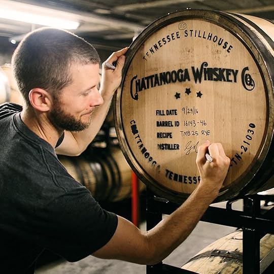 Man signing barrel at Chattanooga Whiskey in Tennessee