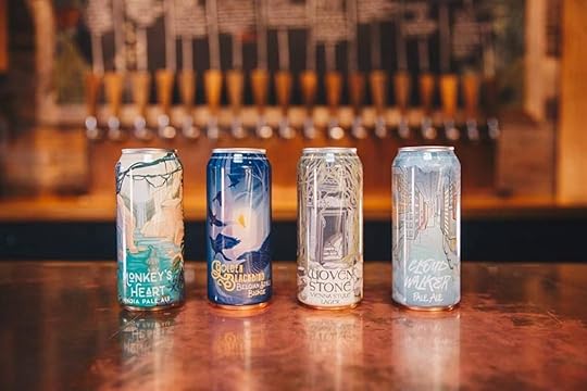 Beer cans on the bar at OddStory Brewing Company