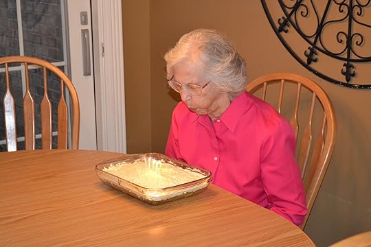 Image may contain: one or more people, people sitting, table and indoor