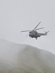 Puma Mountain rescue helicopter practicing in low cloud near Fairfield