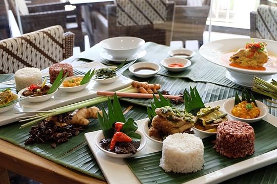 Traditional Indonesian meal laid out on a table