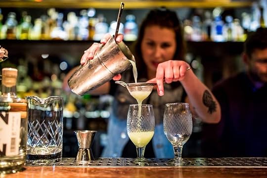 Vesper Bar in Amsterdam, bartender pouring a cocktail