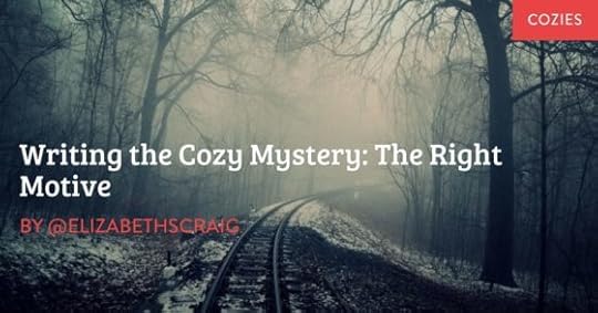 A snowy train track curves into a foggy landscape.