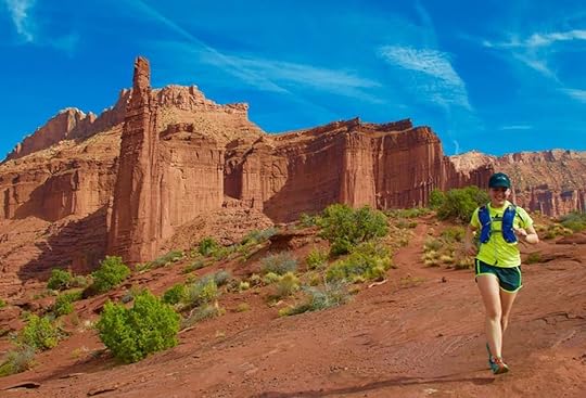 woman running through the Moab desert