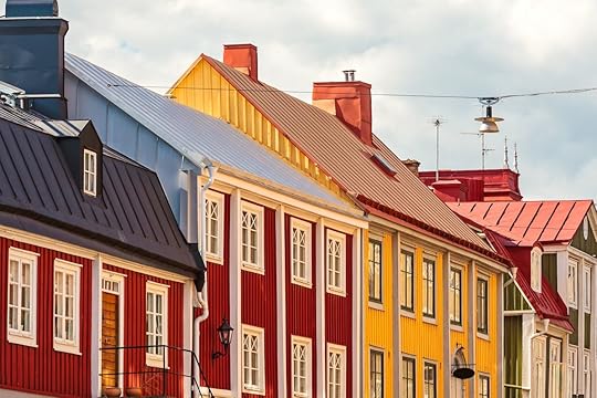 Row of ancient colorful wooden houses in the city of Karlskrona Sweden