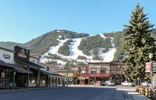Ski slopes in Jackson Hole with panorama of vintage houses