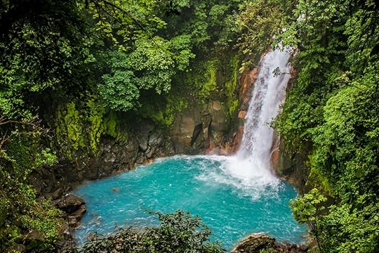Rio Celeste waterfall in the jungle in Costa Rica