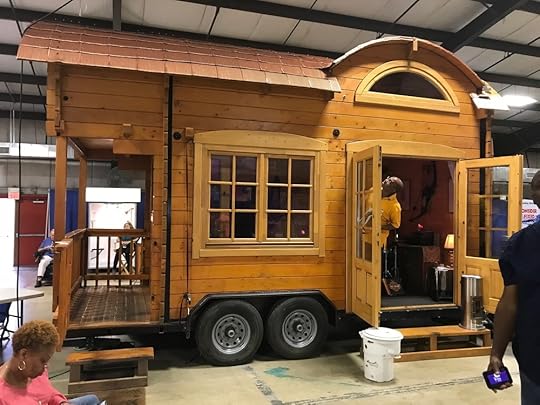 Such careful detail! That half-moon window is so charming.