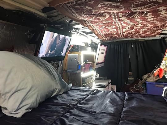 Flat screens and party lights inside the work van. It’s a rolling fiesta.