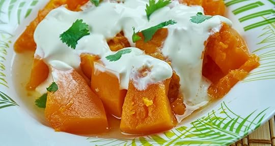 Afghan and Turkish pumpkin dish made by frying pumpkin topped with sour cream