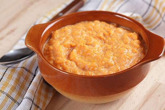 Pumpkin soup in the rustic bowl closeup
