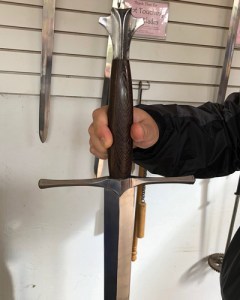 Sword handle, guard, and pommel