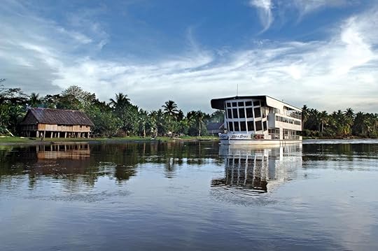 Sepik Spirit cruise ship heading down the Sepik River in Papua New Guinea