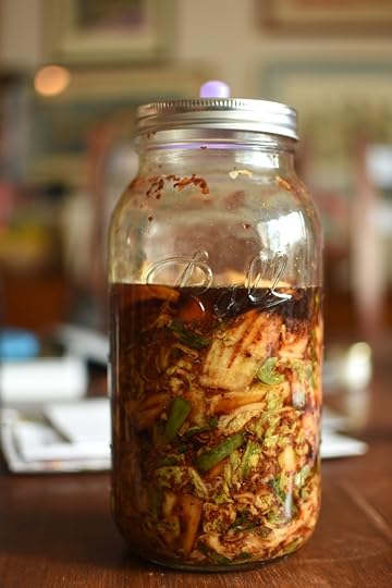 A half gallon jar, filled two-thirds of the way with the quick chopped cabbage kimchi from Korean Home Cooking