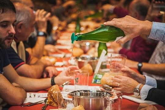 Basque meal and cider pouring from the Sagardoa Route