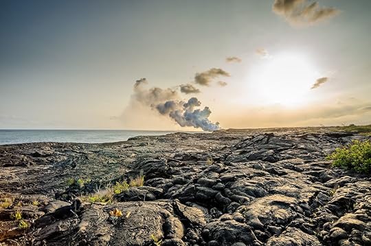 Lava rock and smoke from small volcanic eruption in Hawaii