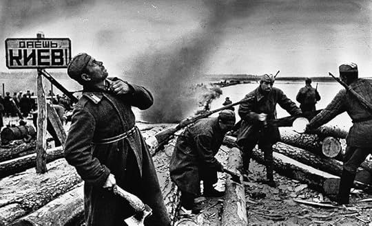 Soviet soldiers preparing rafts to cross the Dnieper (the sign reads “Onward To Kiev!”), Battle of the Dnieper, 1943 (public domain via Wikipedia)