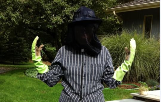 The author, about to tackle a hill full of poison ivy, thistles, and blood-sucking mosquitos.