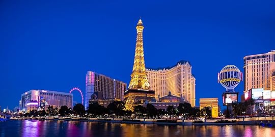 Las Vegas mini eiffel tower, casinos, and city done up in lights