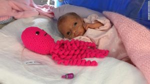 Crocheted octopi comfort and calm premature babies at Poole Hospital in the UK.