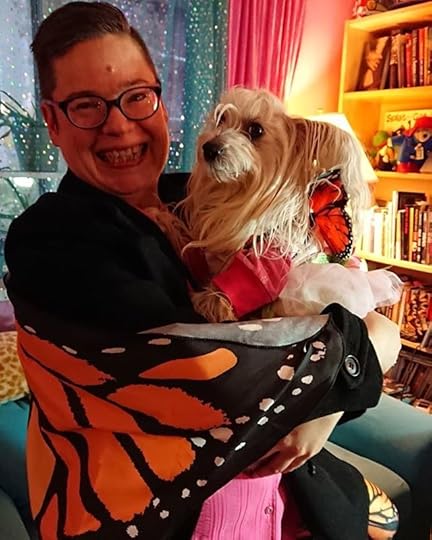 I’ve been finding Halloween harder this year, including the weeks leading up to it-it’s a time when cults increase their torture-but I’ve tried to focus on ways to make it positive tonight: dressing Petal up, and me, and then going out with the three little girls and their baby sister. I love Petal looking cute and adorable as a butterfly fairy, love wearing butterflies myself (can you tell I love Monarch butterflies?), and I love the kids’ enjoyment and delight in spending time with me.<br /><br />I wish stores and houses didn’t display gruesome decorations like chopped, bloody limbs; human skulls; skeletons; spiders; masks, and gravestones, all of which are used in cult torture and abuse (real ones, not fake), but I’ve been getting through, and now I’m back home cuddling Petal and relaxing.<br /><br />#cherylrainfield #YAwriter #LGBTQwriter #booknerd #bookworm #ireadYA #survivor #feminist<br />#monarchbutterflies<br />#petalrainfield #chinesecrested #hairyhairless #dogstagram #ilovemydog #ilovemychinesecresteddog #servicedog #dogmom