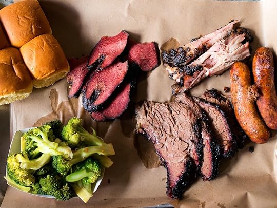 BBQ and smoked meats with broccoli and rolls