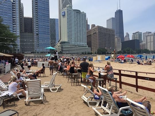 Caffe Olivia chairs in the sand opposite Chicago skyline