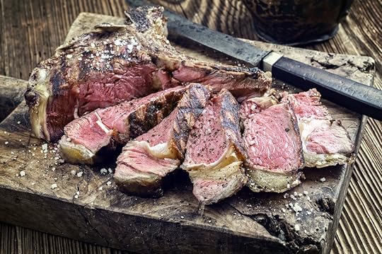 Bistecca alla Fiorentina on a cutting board