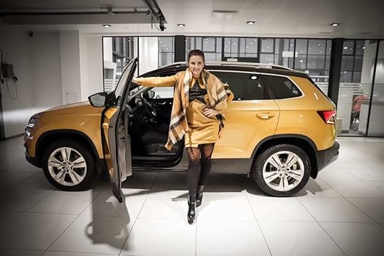 merilin-taimre-paljas-porgand-uus-auto-škoda-eesti-karoq-elegance-varustus-diisel-mootor-kütus-maastur-oranž-kuldne-kleebis-nelivedu