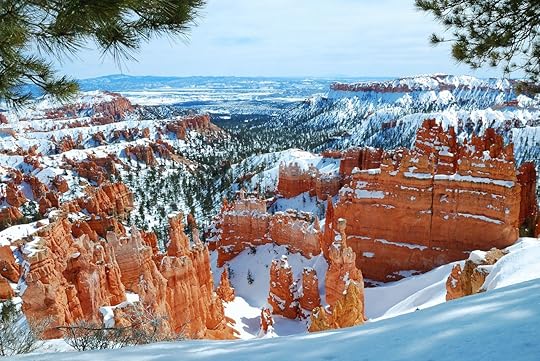 Bryce canyon panorama with snow in winter with red rocks and blue sky - national parks in winter
