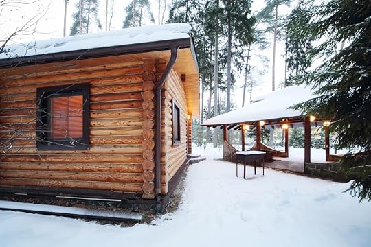 Wooden sauna house in the snowy woods
