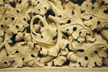 Carved leaves and acorns. No melons.