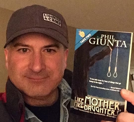 Holding my latest book!