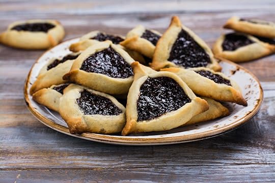 Traditional Jewish Hamantaschen cookies with berry jam