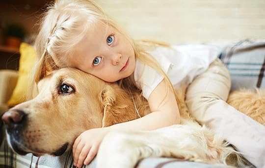 Girl Cuddling with Dog