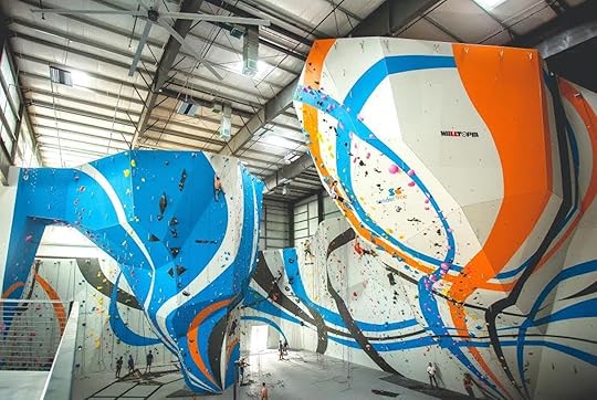 Colorful rock walls in a rock climbing gym