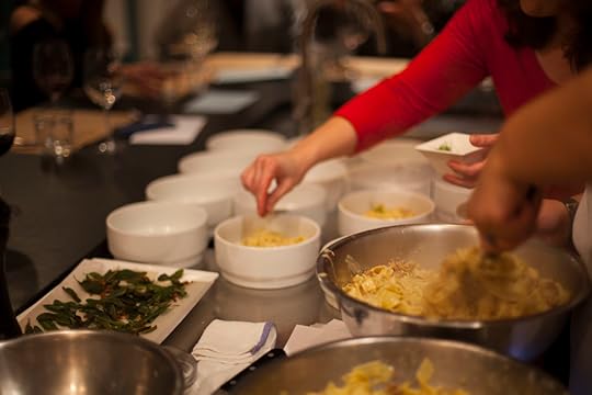  Here I am garnishing the pappardelle with fennel fronds while Samar is tossing the next batch of pasta with the fennel cream. 