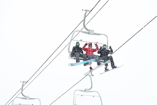 Skiers on a chairlift at Soda Springs Ski Resort
