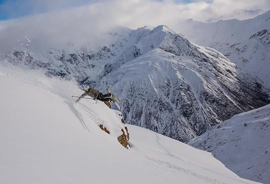 Skier doing jumps on the mountain at Temple Basin
