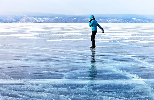 Girl skating and talking on a mobile phone