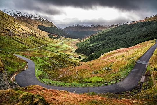Winding mountain road over a canyon