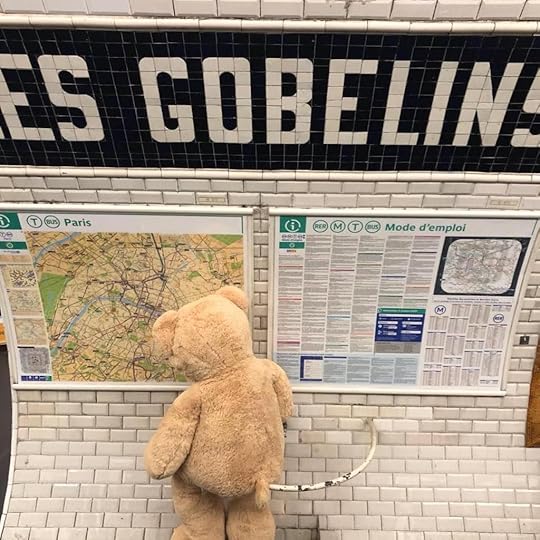 Giant teddy bear in the Paris Metro