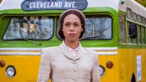 Rosa Parks stands in front of a bus in the Doctor Who episode 