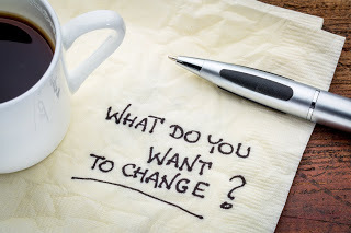 image of a napkin with the words penned on it, what do you want to change