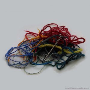 Photo of handspun ends leftovers of a project by PSG