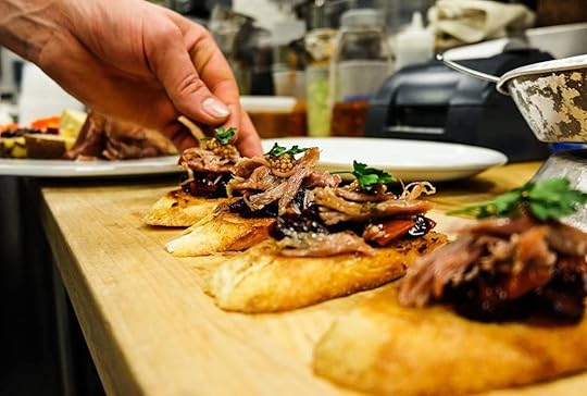 Crispy bread topped with pulled pork