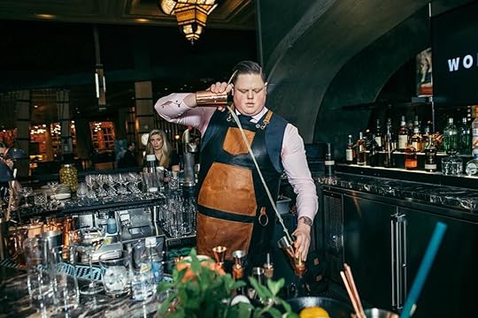 Bartender pouring drinks at the Copper Spoon in Ft. Worth