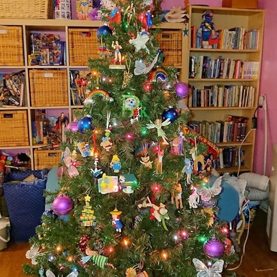 I also put up my Christmas tree the other day, and then finally decorated it today. It is probably too full of things but I love them all. I have fairies and unicorns and a pegasus; bookish decorations, especially kid-lit ones; superheroes; rainbows; and ornaments from people that I care about or that I bought when I was with them. And of course Petal! All of them have meaning to me. Some of them are for child parts of me that didn’t get to play when I was a kid, some of them are for the writer in me, and there are so many others. I think it’s important that we do what makes us feel good. So it might not look like a tree out of a magazine, but it’s a tree that feels right to me.<br /><br />What kind of decorations do you like to put on a tree, or have around during the holidays?<br /><br />#christmastree #writerchristmas<br />#cherylrainfield #YAwriter #LGBTQwriter #booknerd #bookworm #ireadYA #survivor #feminist