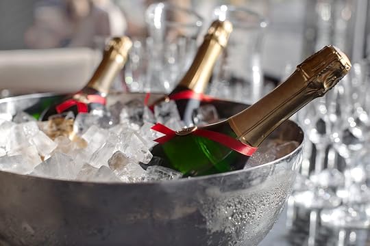 Champagne bottles in an ice bucket