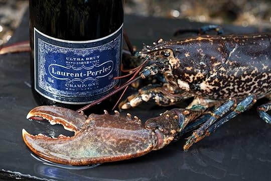 Laurent Perrier Ultra Brut Shampagne with a shellfish